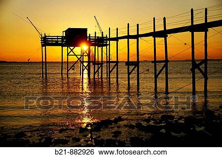 Stock Photograph - ? Carr?? (fishing house) near Marennes, Charente-Maritime, Poitou-Charentes, France. Fotosearch