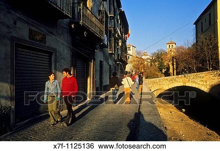 Carrera del Darro street and in background church of San Pedro y San Pablo Albaic? n quarter Granada, Andalucia, Spain View Large Photo Image Stock Photograph - Carrera del Darro street and in background church of San Pedro y San Pablo Albaic? n quarter Granada, Andalucia, Spain. Fotosearch