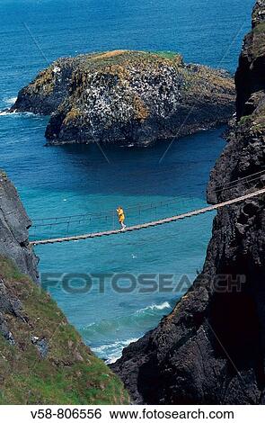 Carrick-a-rede rope bridge, County Antrim, Northern Ireland, United Kingdom View Large Photo Image Stock Photograph - Carrick-a-rede rope bridge, County Antrim, Northern Ireland, United Kingdom. Fotosearch