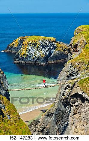 Carrick-A-Rede Rope Bridge Larrybane Bay Causeway Coastal Route Antrim County, Northern Ireland, Europe. View Large Photo Image Stock Image - Carrick-A-Rede Rope Bridge Larrybane Bay Causeway Coastal Route Antrim County, Northern Ireland, Europe.. Fotosearch