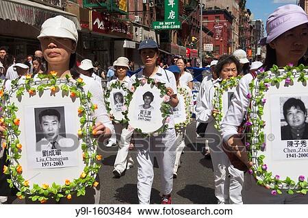 Carrying banners and signs members of Falun Dafa Falun Gong from around the world parade through the streets of Chinatown in New York Practitioners of Falun Dafa claim that they are being persecuted by the government in China for their spiritual beliefs View Large Photo Image Picture - Carrying banners and signs members of Falun Dafa Falun Gong from around the world parade through the streets of Chinatown in New York Practitioners of Falun Dafa claim that they are being persecuted by the government in China for their spiritual beliefs. Fotosearch