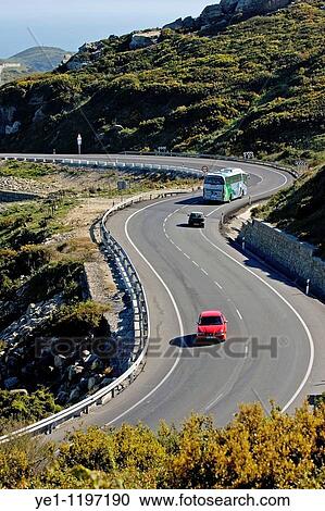 Stock Image - Cars and buses driving on e5 n340 highway near Tarifa, Andalusia, Spain.. Fotosearch