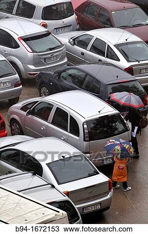 Cars and people with umbrella View Large Photo Image Stock Image - Cars and people with umbrella. Fotosearch