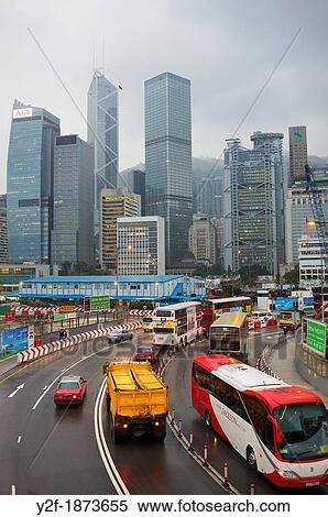 cars, buses and trucks with Hong Kong skyline at Central View Large Photo Image Stock Photography - cars, buses and trucks with Hong Kong skyline at Central. Fotosearch