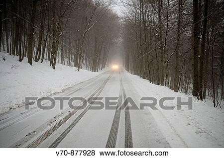 Cars going through Santa Fe del Montseny's road with fog View Large Photo Image Stock Photo - Cars going through Santa Fe del Montseny's road with fog. Fotosearch