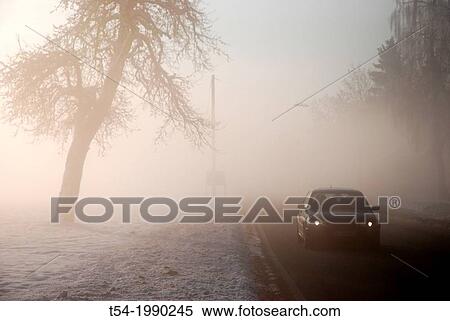 Cars in the winter fog View Large Photo Image Stock Photography - Cars in the winter fog. Fotosearch
