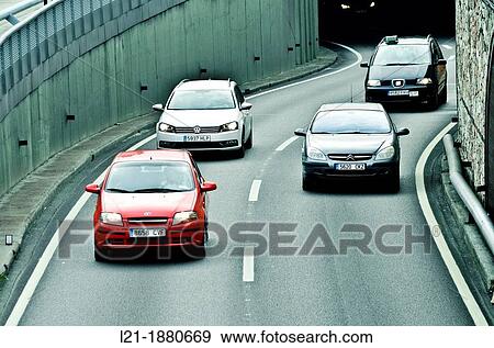 Cars move around the city. Ronda del Litoral, Barcelona, Catalonia, Spain. View Large Photo Image Stock Photo - Cars move around the city. Ronda del Litoral, Barcelona, Catalonia, Spain.. Fotosearch