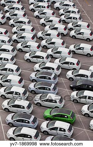 Cars parked in the port of Valencia waiting to be shipped Valencia, Spain View Large Photo Image Stock Photo - Cars parked in the port of Valencia waiting to be shipped Valencia, Spain. Fotosearch