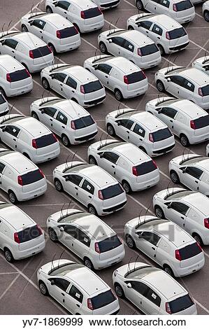 Stock Photo - Cars parked in the port of Valencia waiting to be shipped Valencia, Spain. Fotosearch
