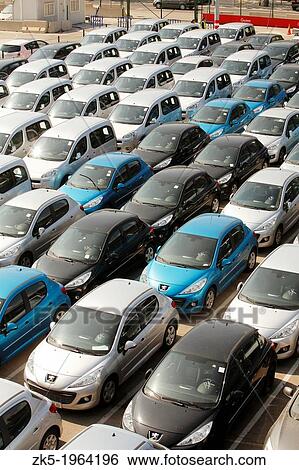 Stock Photograph - Cars ready for shipment, port of Valencia, Spain.. Fotosearch
