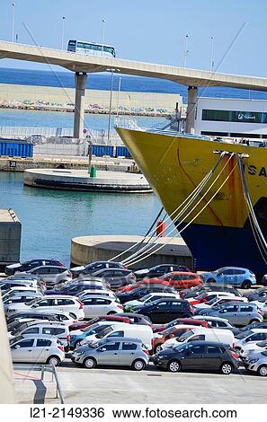 Stock Photograph - Cars waiting for board. Harbour, Barcelona, Catalonia, Spain.. Fotosearch