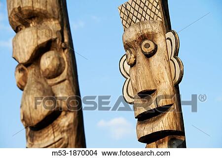 Carved wooden pole called Jangseung meaning Village Guardian This Korean Totel Pole were traditionally placed around the outskirts of the villages in order to protect them from demons Seoul South Korea View Large Photo Image Picture - Carved wooden pole called Jangseung meaning Village Guardian This Korean Totel Pole were traditionally placed around the outskirts of the villages in order to protect them from demons Seoul South Korea. Fotosearch