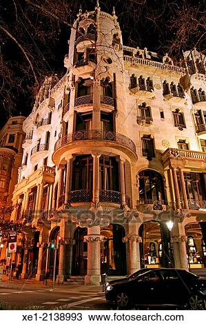 Casa Fuster Hotel at night, 1908-1911, arch. Lluis Domenech i Montaner, Barcelona, Catalonia, Spain View Large Photo Image Stock Image - Casa Fuster Hotel at night, 1908-1911, arch. Lluis Domenech i Montaner, Barcelona, Catalonia, Spain. Fotosearch