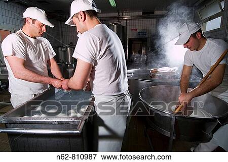 casari preparing mozzarella of bufala typical Italian food View Large Photo Image Stock Photo - casari preparing mozzarella of bufala typical Italian food. Fotosearch