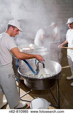 Stock Photography - casari preparing mozzarella of bufala typical Italian food. Fotosearch
