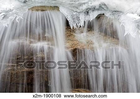 Stock Photo - Cascade along the Swift River in Livermore, New Hampshire USA during the winter months. Fotosearch