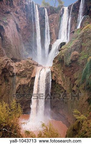 Cascades d`Ouzoud Tanaghmeilt Azilal Morocco Ouzoud waterfalls on fast flowing El Abid River in gorge in Middle Atlas mountains View Large Photo Image Stock Image - Cascades d`Ouzoud Tanaghmeilt Azilal Morocco Ouzoud waterfalls on fast flowing El Abid River in gorge in Middle Atlas mountains. Fotosearch