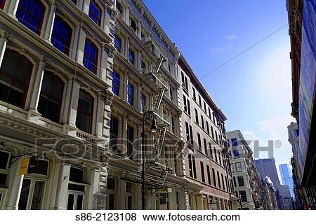 Cast Iron Landmarked Buildings with Exterior Fire Escapes, Green Street, Soho, Manhattan, New York City. View Large Photo Image Stock Photo - Cast Iron Landmarked Buildings with Exterior Fire Escapes, Green Street, Soho, Manhattan, New York City.. Fotosearch