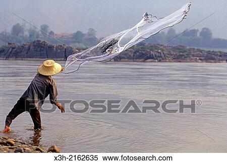 cast net fishing on the Mekong River in northeastern Thailand, Southeast Asia. View Large Photo Image Stock Photography - cast net fishing on the Mekong River in northeastern Thailand, Southeast Asia.. Fotosearch