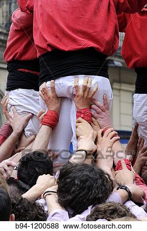 Stock Photo - Castellers traditional human towers, Barcelona, Catalonia, Spain. Fotosearch