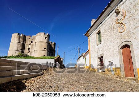 castillo renacentista y casa de Joaquim Antonio Saramago, Evoramonte ( concejo de Estremoz), Alentejo, Portugal. View Large Photo Image Stock Photo - castillo renacentista y casa de Joaquim Antonio Saramago, Evoramonte ( concejo de Estremoz), Alentejo, Portugal.. Fotosearch