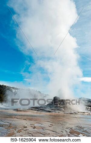 Castle Geyser Erupting, Yellowstone NP, WY View Large Photo Image Picture - Castle Geyser Erupting, Yellowstone NP, WY. Fotosearch