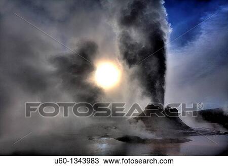 Castle Geyser erupts under a bright sky during winter at Yellowstone National Park View Large Photo Image Stock Image - Castle Geyser erupts under a bright sky during winter at Yellowstone National Park. Fotosearch