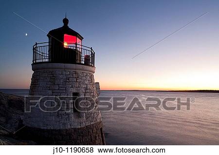 Stock Photo - Castle Hill lighthouse, Narragansett Bay evening, Newport, RI. Fotosearch