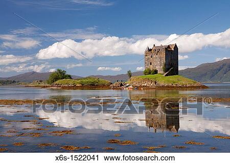 Stock Image - Castle of Stalker near Appin village - An Apainn -, Highlands, Scotland. Fotosearch