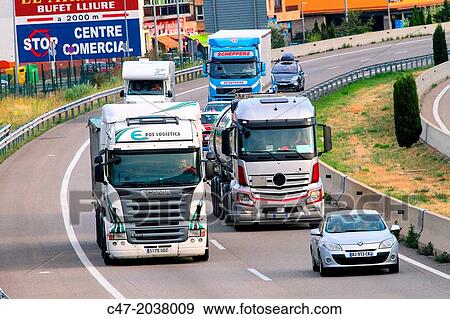 Catalunya, Spain, Girona province, l? Alt EmpordB area, Traffic at the AP-7 Autopista del MediterrBneo at La Jonquera. The Autopista AP-7 is a Spanish highway and a toll motorway that runs along the Mediterranean coast of Spain. View Large Photo Image Stock Photo - Catalunya, Spain, Girona province, l? Alt EmpordB area, Traffic at the AP-7 Autopista del MediterrBneo at La Jonquera. The Autopista AP-7 is a Spanish highway and a toll motorway that runs along the Mediterranean coast of Spain.. Fotosearch