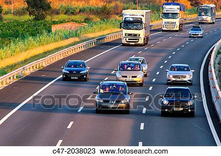 Catalunya, Spain, Girona province, Giron's area, Traffic at the AP-7 Autopista del MediterrBneo near Pont de Molins. The Autopista AP-7 is a Spanish highway and a toll motorway that runs along the Mediterranean coast of Spain. View Large Photo Image Stock Image - Catalunya, Spain, Girona province, Giron's area, Traffic at the AP-7 Autopista del MediterrBneo near Pont de Molins. The Autopista AP-7 is a Spanish highway and a toll motorway that runs along the Mediterranean coast of Spain.. Fotosearch