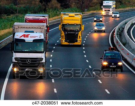 Catalunya, Spain, Girona province, Giron's area, Traffic at the AP-7 Autopista del MediterrBneo near Pont de Molins. The Autopista AP-7 is a Spanish highway and a toll motorway that runs along the Mediterranean coast of Spain. View Large Photo Image Stock Image - Catalunya, Spain, Girona province, Giron's area, Traffic at the AP-7 Autopista del MediterrBneo near Pont de Molins. The Autopista AP-7 is a Spanish highway and a toll motorway that runs along the Mediterranean coast of Spain.. Fotosearch