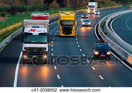 Catalunya, Spain, Girona province, Giron's area, Traffic at the AP-7 Autopista del MediterrBneo near Pont de Molins. The Autopista AP-7 is a Spanish highway and a toll motorway that runs along the Mediterranean coast of Spain. View Large Photo Image Stock Image - Catalunya, Spain, Girona province, Giron's area, Traffic at the AP-7 Autopista del MediterrBneo near Pont de Molins. The Autopista AP-7 is a Spanish highway and a toll motorway that runs along the Mediterranean coast of Spain.. Fotosearch