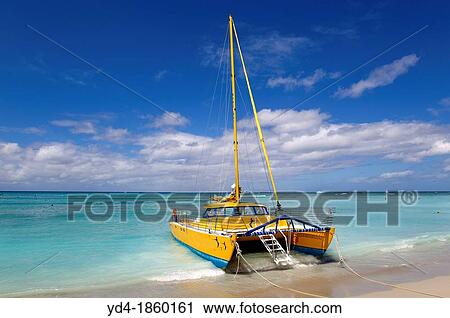 Stock Image - Catamaran in the shore, Waikiki Beach, O`ahu Island, Hawaii USA. Fotosearch