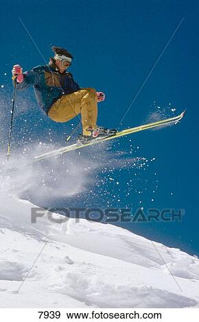 Stock Photo - Catching air off cornice. Fotosearch