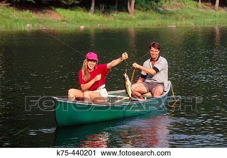 catching fish from a canoe View Large Photo Image Stock Image - catching fish from a canoe. Fotosearch