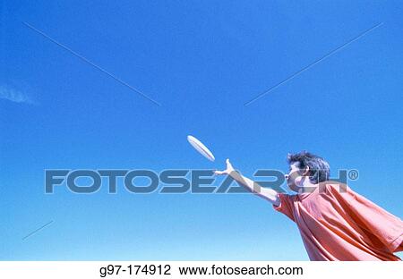 Catching frisbee View Large Photo Image Stock Image - Catching frisbee. Fotosearch