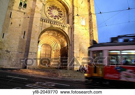 Cathedral at dusk and Typical tram in Lisbon Portugal. View Large Photo Image Stock Image - Cathedral at dusk and Typical tram in Lisbon Portugal.. Fotosearch