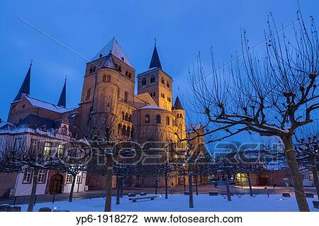 Stock Image - Cathedral of Trier in winter, illuminated at night, World Heritage Site, Trier, Rhineland-Palatinate, Germany. Fotosearch