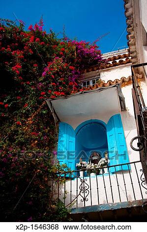 Catholic detail in the downtown of Marbella, Costa del Sol, Andalucia, Spain View Large Photo Image Stock Photo - Catholic detail in the downtown of Marbella, Costa del Sol, Andalucia, Spain. Fotosearch