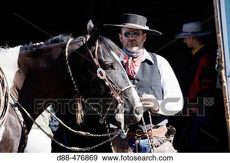 Cattleman with? Quarter horse? and/or? Paint? of USA. Ponderosa Ranch. Seneca. Oregon. USA View Large Photo Image Stock Photo - Cattleman with? Quarter horse? and/or? Paint? of USA. Ponderosa Ranch. Seneca. Oregon. USA. Fotosearch