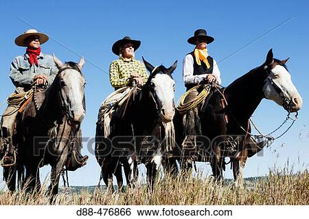 Stock Photograph - Cattlemen with? Quarter horse? and/or? Paint? of USA. Ponderosa Ranch. Seneca. Oregon. USA. Fotosearch
