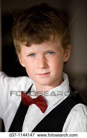 Caucasian boy wearing a bow tie View Large Photo Image Stock Photo - Caucasian boy wearing a bow tie. Fotosearch