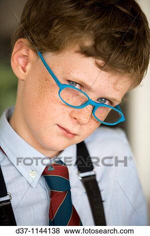 Caucasian boy wearing glasses View Large Photo Image Stock Photo - Caucasian boy wearing glasses. Fotosearch