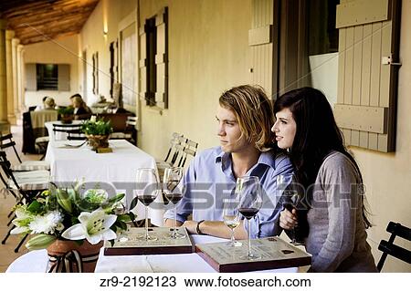 Caucasian couple outdoors at a Chocolate and wine pairing, Waterford wine estate, Franschhoek, Western Cape, South Africa. View Large Photo Image Stock Image - Caucasian couple outdoors at a Chocolate and wine pairing, Waterford wine estate, Franschhoek, Western Cape, South Africa.. Fotosearch