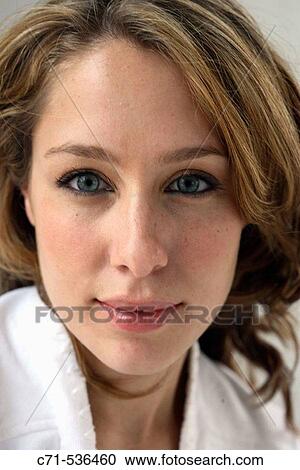 Caucasian woman looking into the camera View Large Photo Image Stock Image - Caucasian woman looking into the camera. Fotosearch