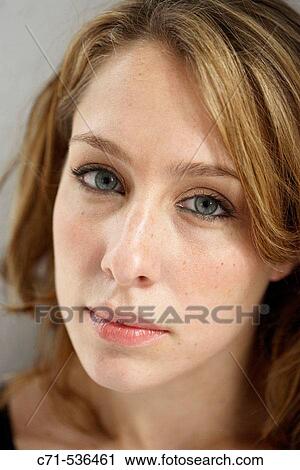 Caucasian woman looking into the camera View Large Photo Image Stock Image - Caucasian woman looking into the camera. Fotosearch