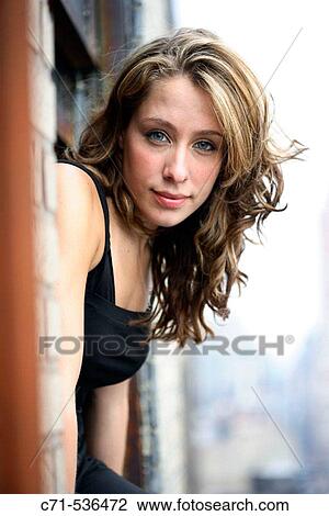 Caucasian woman looking into the camera View Large Photo Image Stock Image - Caucasian woman looking into the camera. Fotosearch