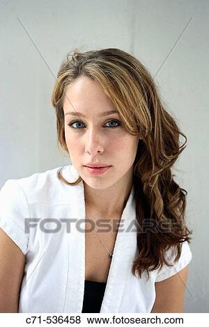 Stock Photo - Caucasian woman looking into the camera. Fotosearch