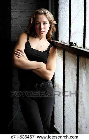 Caucasian woman looking into the camera View Large Photo Image Stock Photo - Caucasian woman looking into the camera. Fotosearch